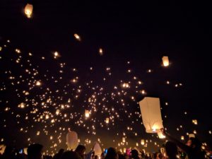 Floating lanterns at night